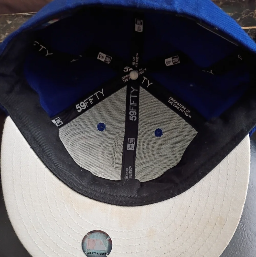 Blue Atlanta Braves New Era Fitted Hat         Size  7 1/8. Gently Used.